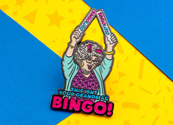 Enamel lapel pin featuring a grandma holding Bingo Loco glow sticks with the text This Isn't Your Grandma's Bingo.