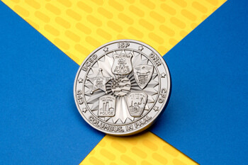 Silver challenge coin featuring Indiana State Police, BCSD, DNR, CFD, and CPD emblems with central flag design on a blue and yellow background.
