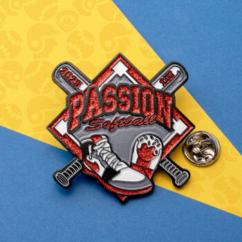 Custom enamel trading pin for Passion Softball featuring crossed bats, a cleat, and red glitter accents on a baseball diamond background.